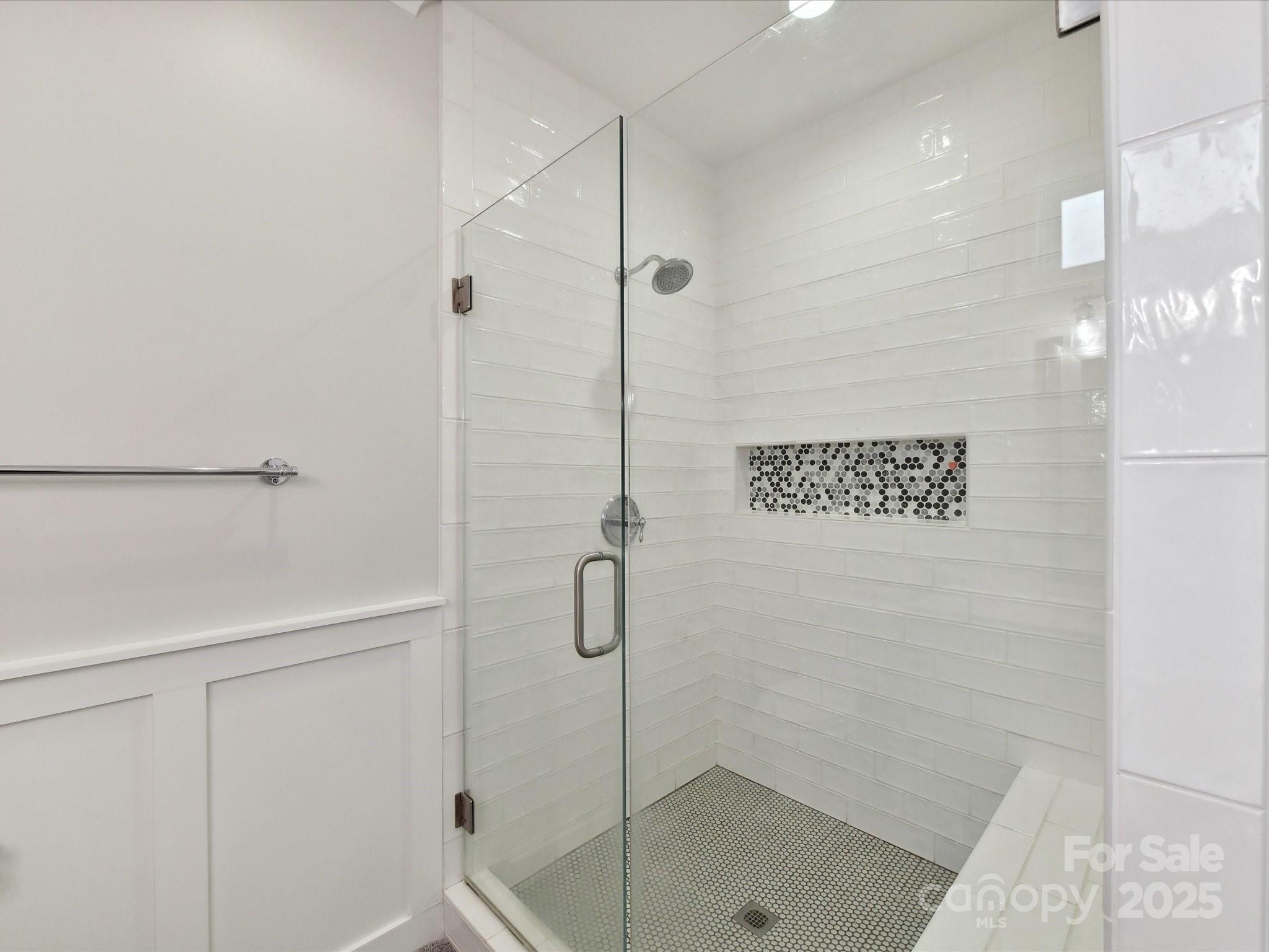 335 Greystone Road Charlotte, NC 28209 - Photo 20 of 37 a bathroom with a shower