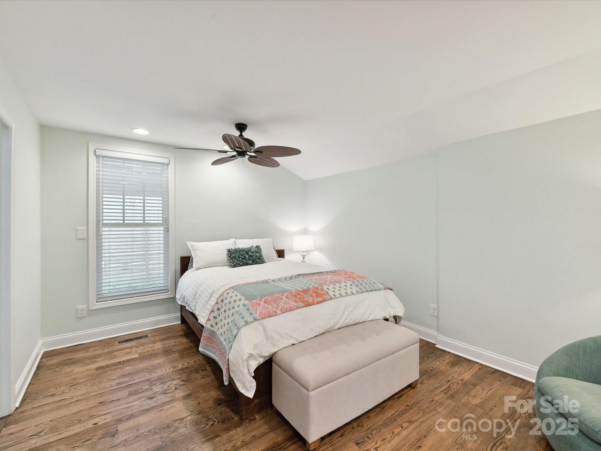 335 Greystone Road Charlotte, NC 28209 - Photo 23 of 37 a bed room with a bed and a window
