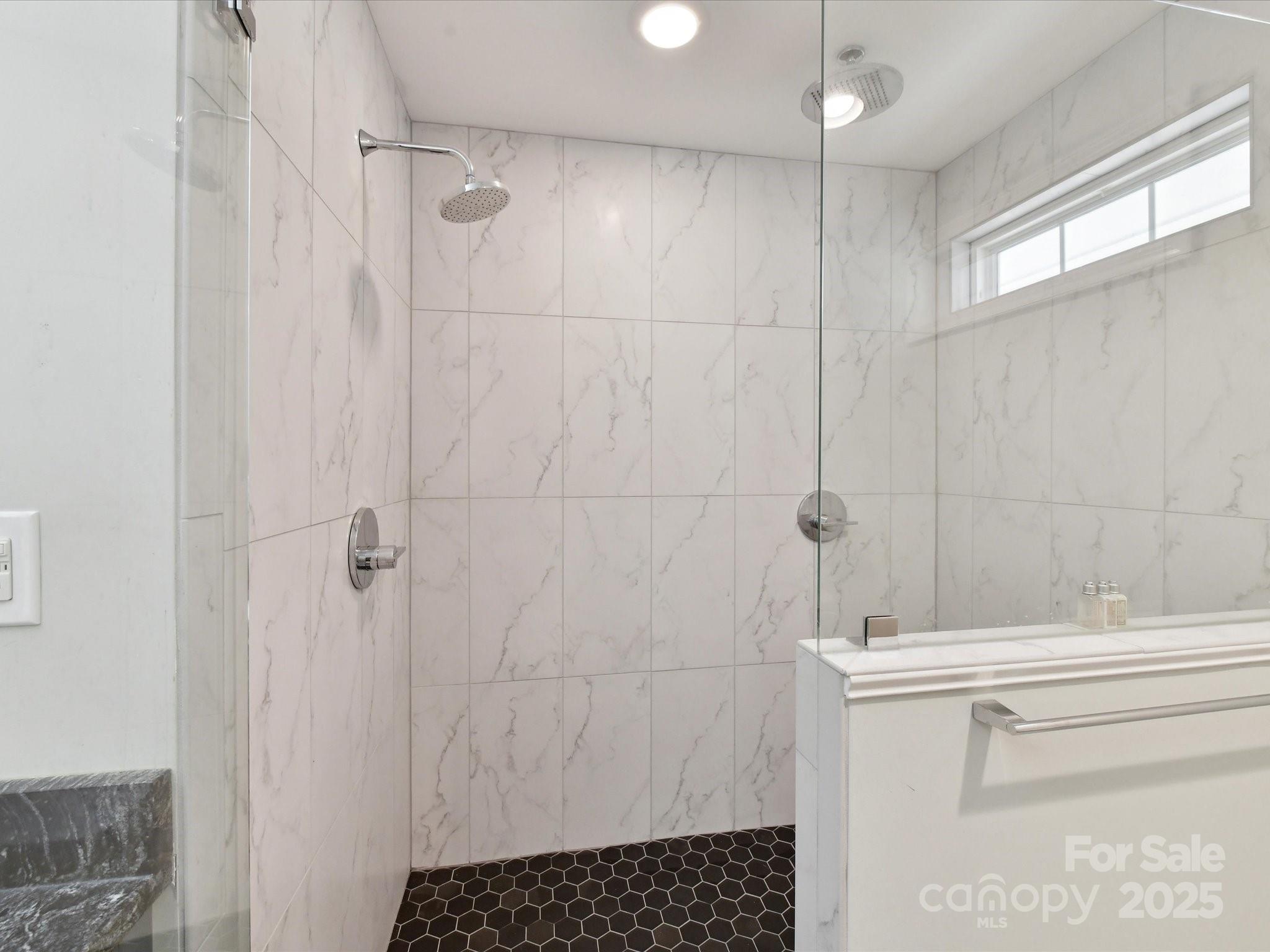 335 Greystone Road Charlotte, NC 28209 - Photo 26 of 37 a bathroom with a shower and a toilet
