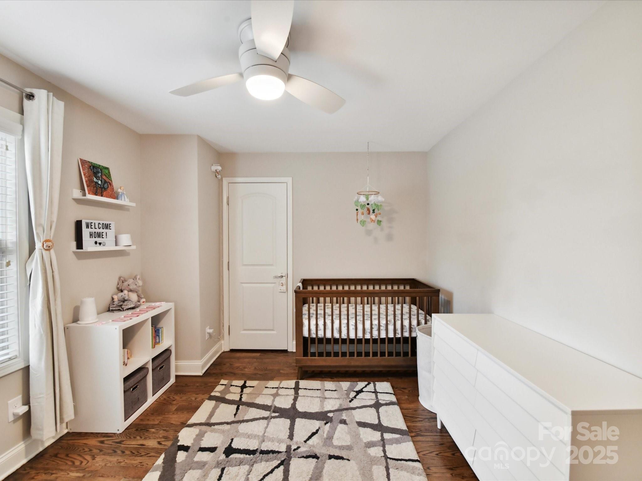 335 Greystone Road Charlotte, NC 28209 - Photo 27 of 37 a view of a room with baby crib and furniture