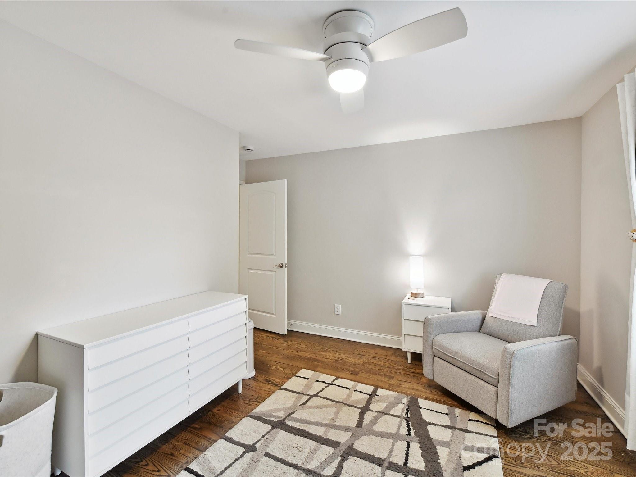 335 Greystone Road Charlotte, NC 28209 - Photo 28 of 37 a living room with furniture and a rug