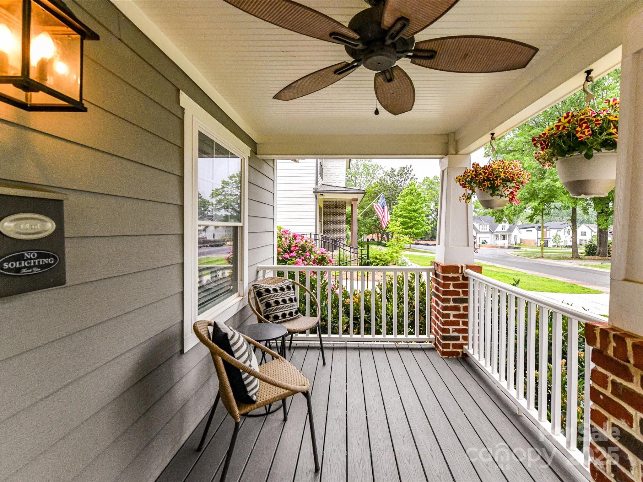 335 Greystone Road Charlotte, NC 28209 - Photo 3 of 37 a view of a porch with furniture and a yard