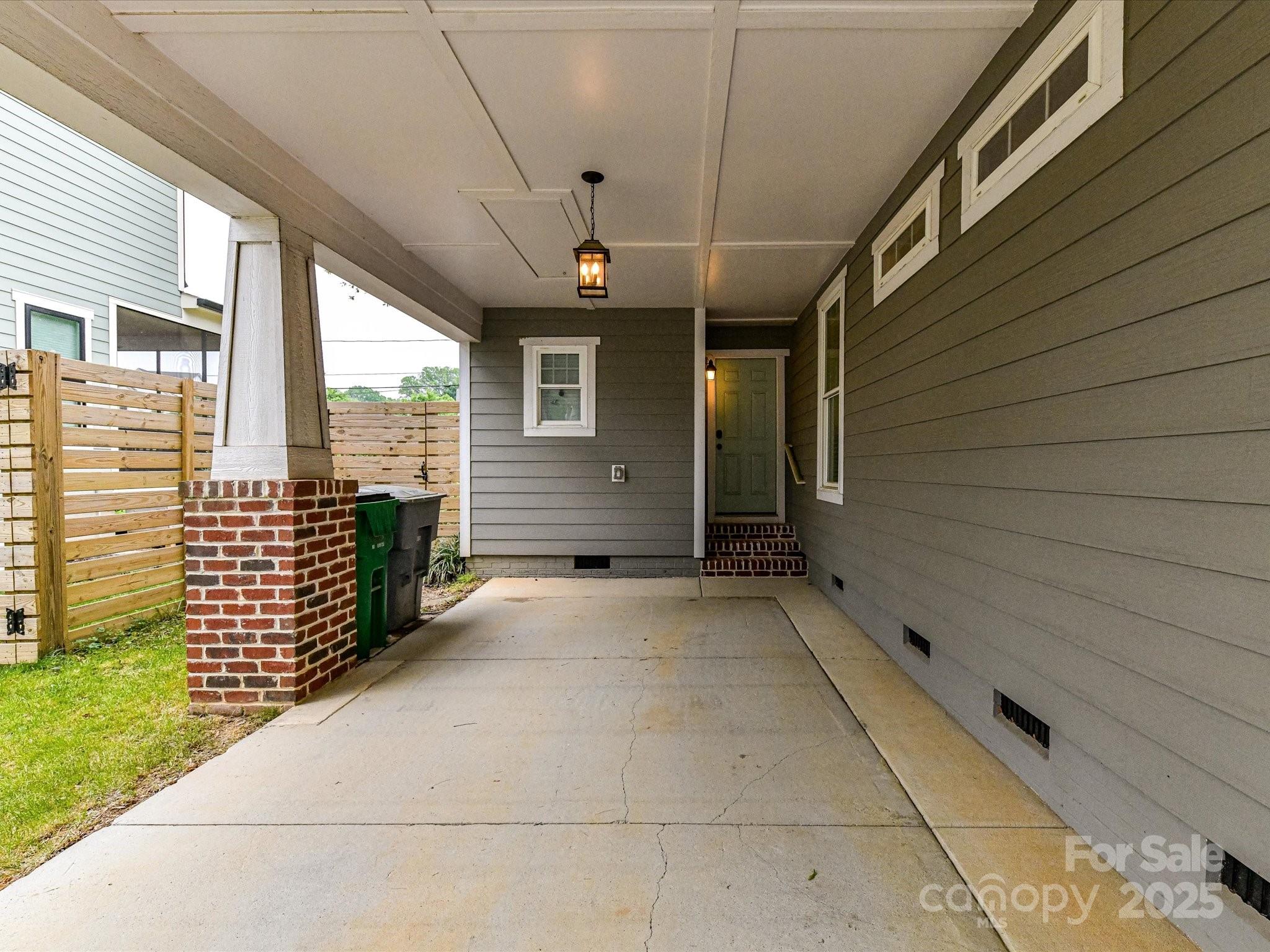 335 Greystone Road Charlotte, NC 28209 - Photo 32 of 37 a view of a porch with wooden floor