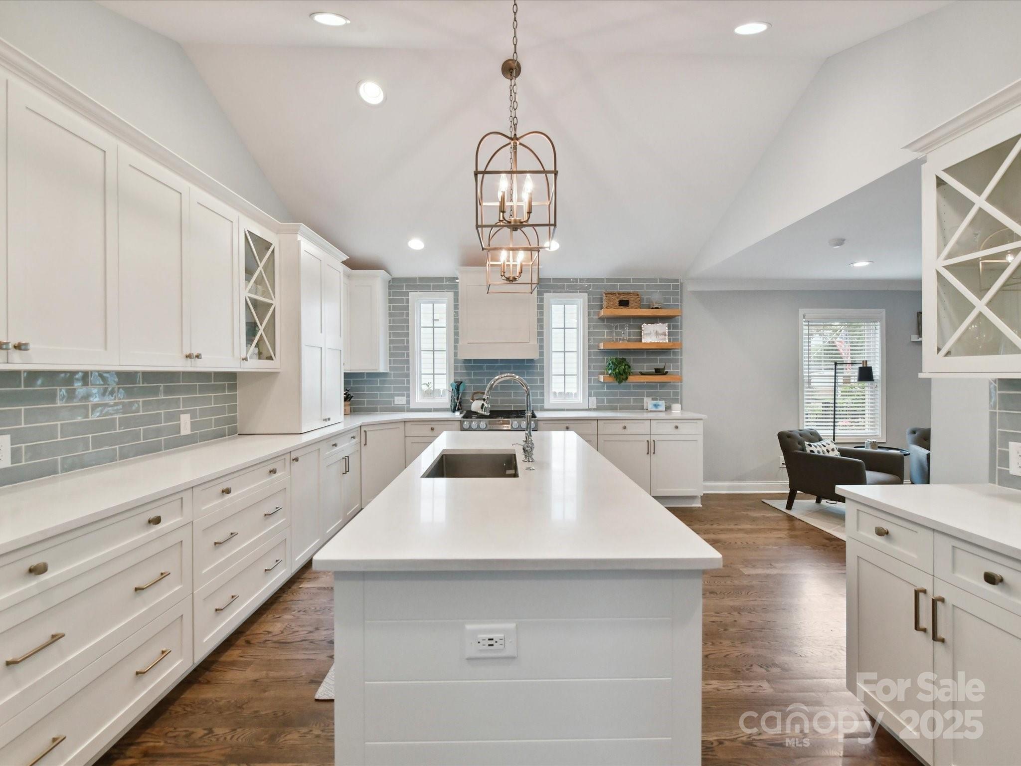 335 Greystone Road Charlotte, NC 28209 - Photo 4 of 37 a kitchen with counter top space cabinets and stainless steel appliances