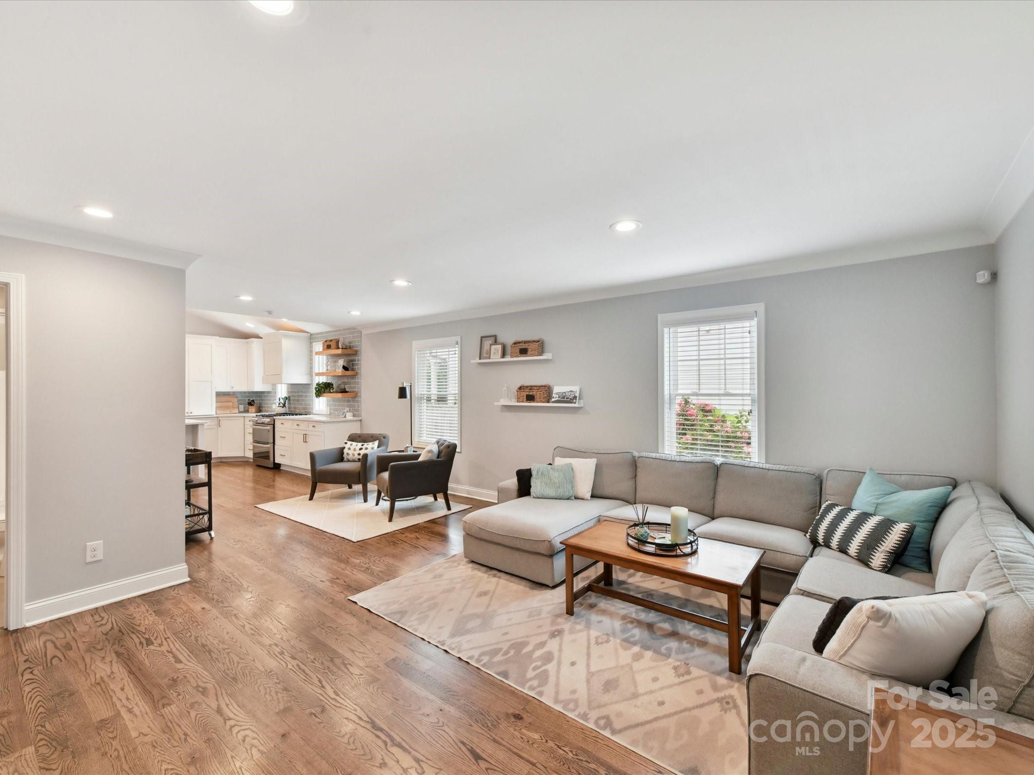 335 Greystone Road Charlotte, NC 28209 - Photo 9 of 37 a living room with furniture and a window