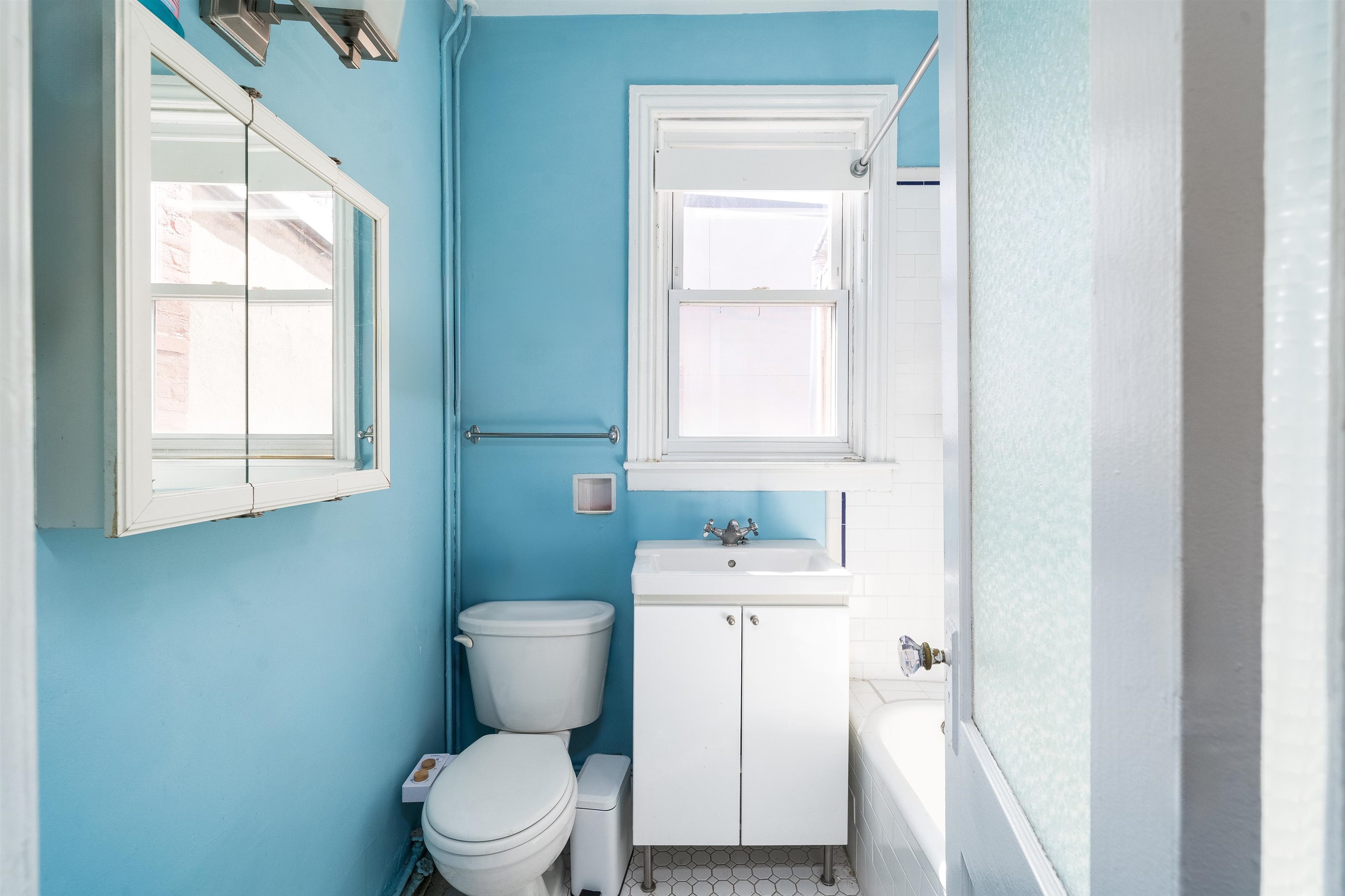800 Bloomfield Street Hoboken, NJ 07030 - Photo 17 of 38 a white toilet sitting next to a bathroom sink