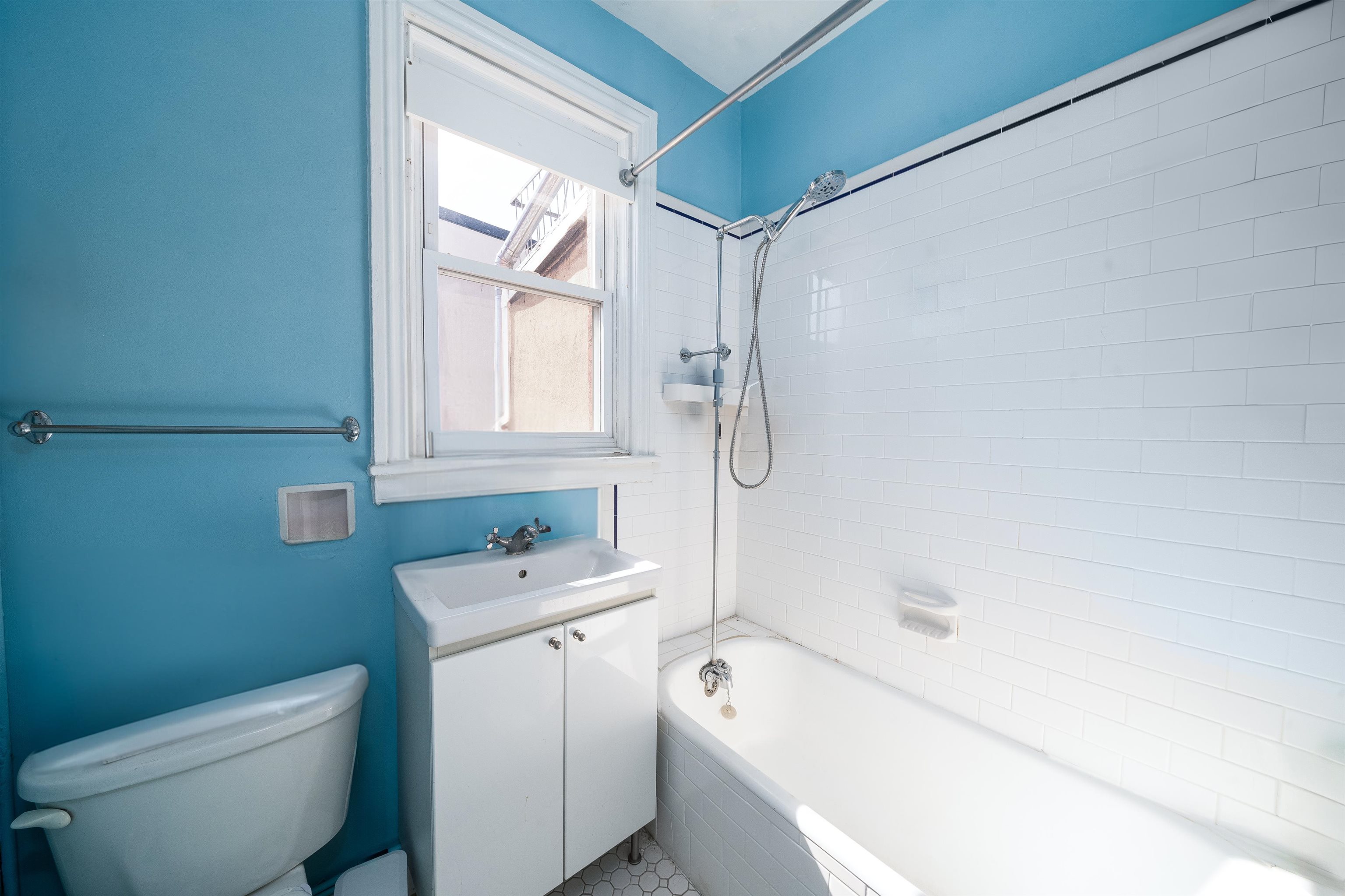 800 Bloomfield Street Hoboken, NJ 07030 - Photo 18 of 38 a bathroom with a sink a toilet and shower