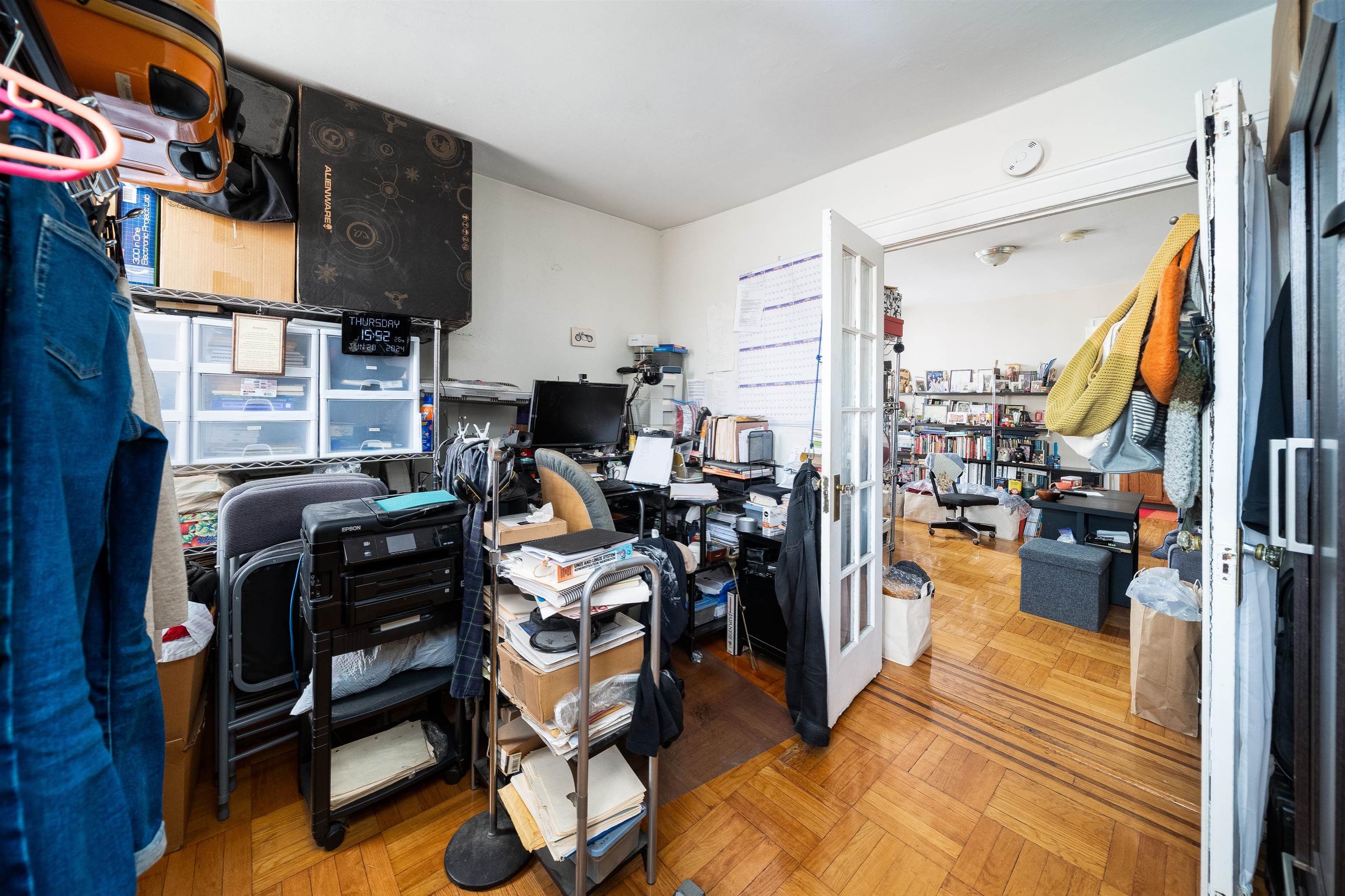 800 Bloomfield Street Hoboken, NJ 07030 - Photo 22 of 38 a view of a kitchen with workspace and living room
