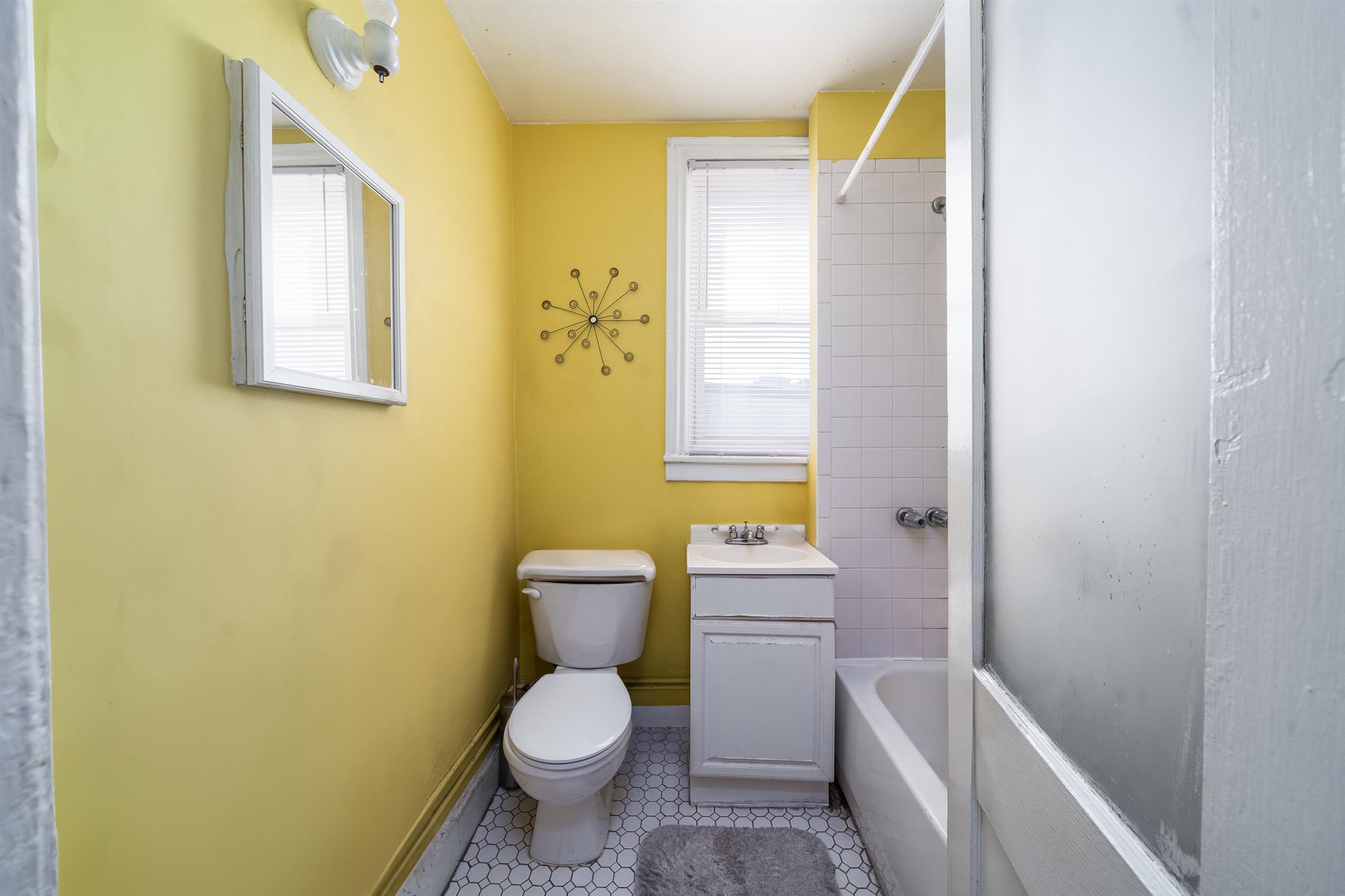 800 Bloomfield Street Hoboken, NJ 07030 - Photo 23 of 38 a white toilet sitting next to a bathroom sink