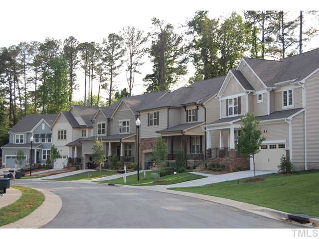511 Bouree Circle Raleigh, NC 27606 - Photo 4 of 10 a front view of a residential houses with yard and green space