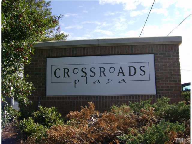 511 Bouree Circle Raleigh, NC 27606 - Photo 5 of 10 a sign broad in front of flowers
