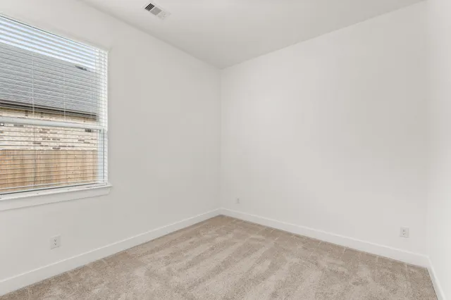 a park with lots of green space and trees