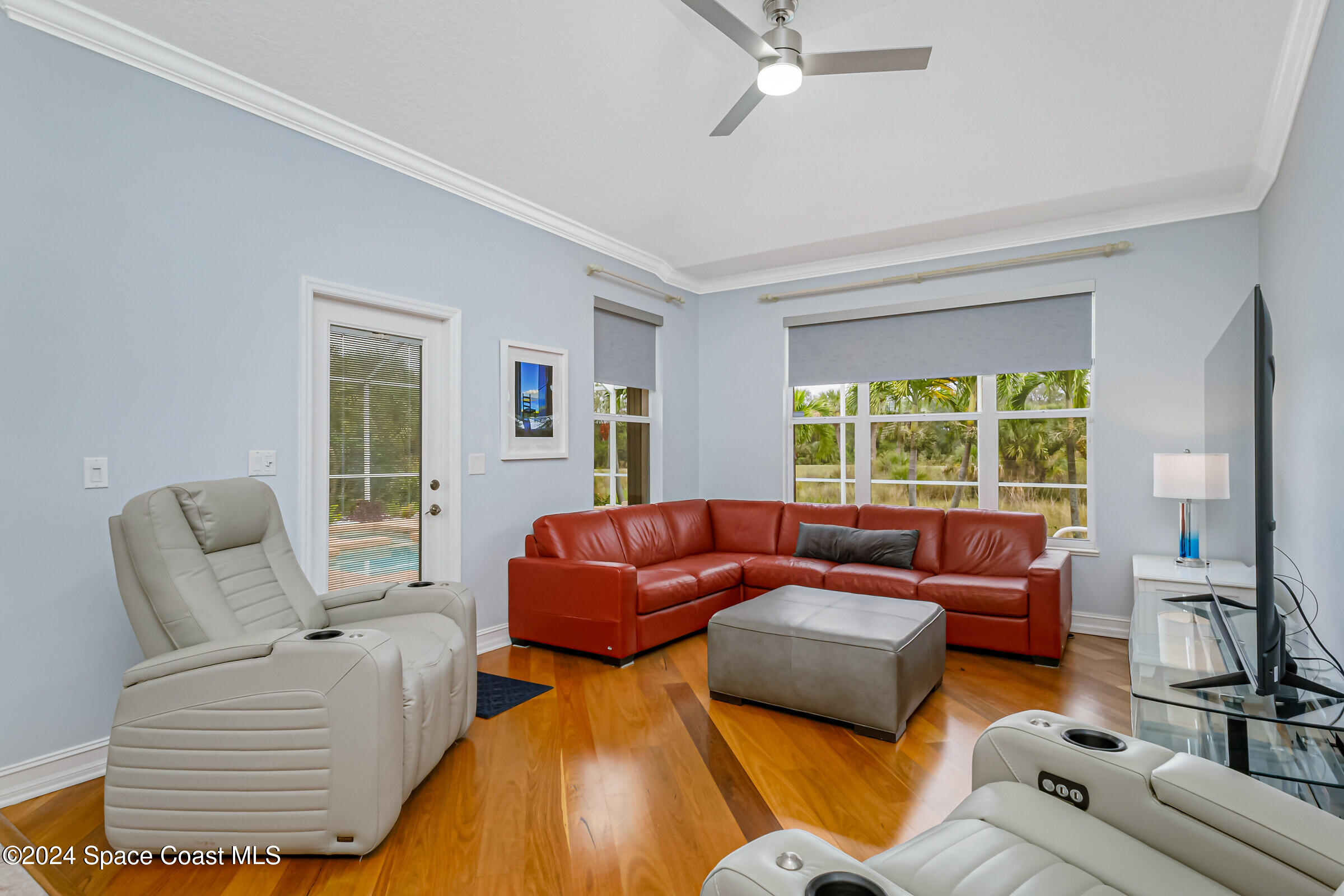 4481 Aberdeen Circle Rockledge, FL 32955 - Photo 14 of 50 a living room with furniture and a large window