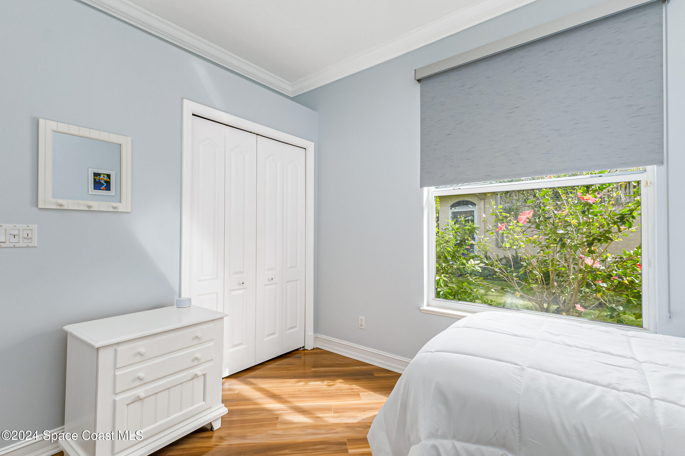 4481 Aberdeen Circle Rockledge, FL 32955 - Photo 24 of 50 a bedroom with a bed and a window