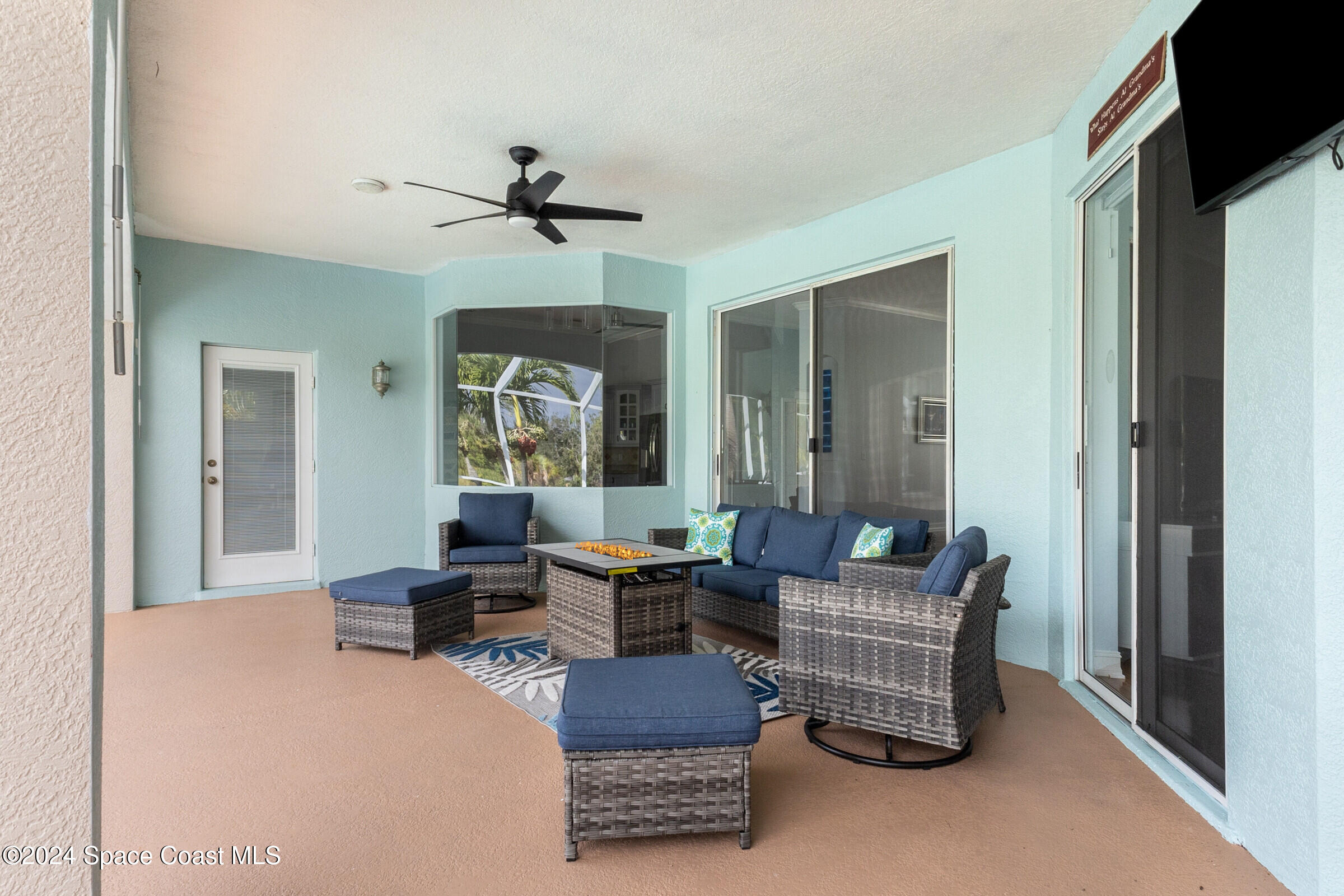 4481 Aberdeen Circle Rockledge, FL 32955 - Photo 28 of 50 a living room with furniture and a window