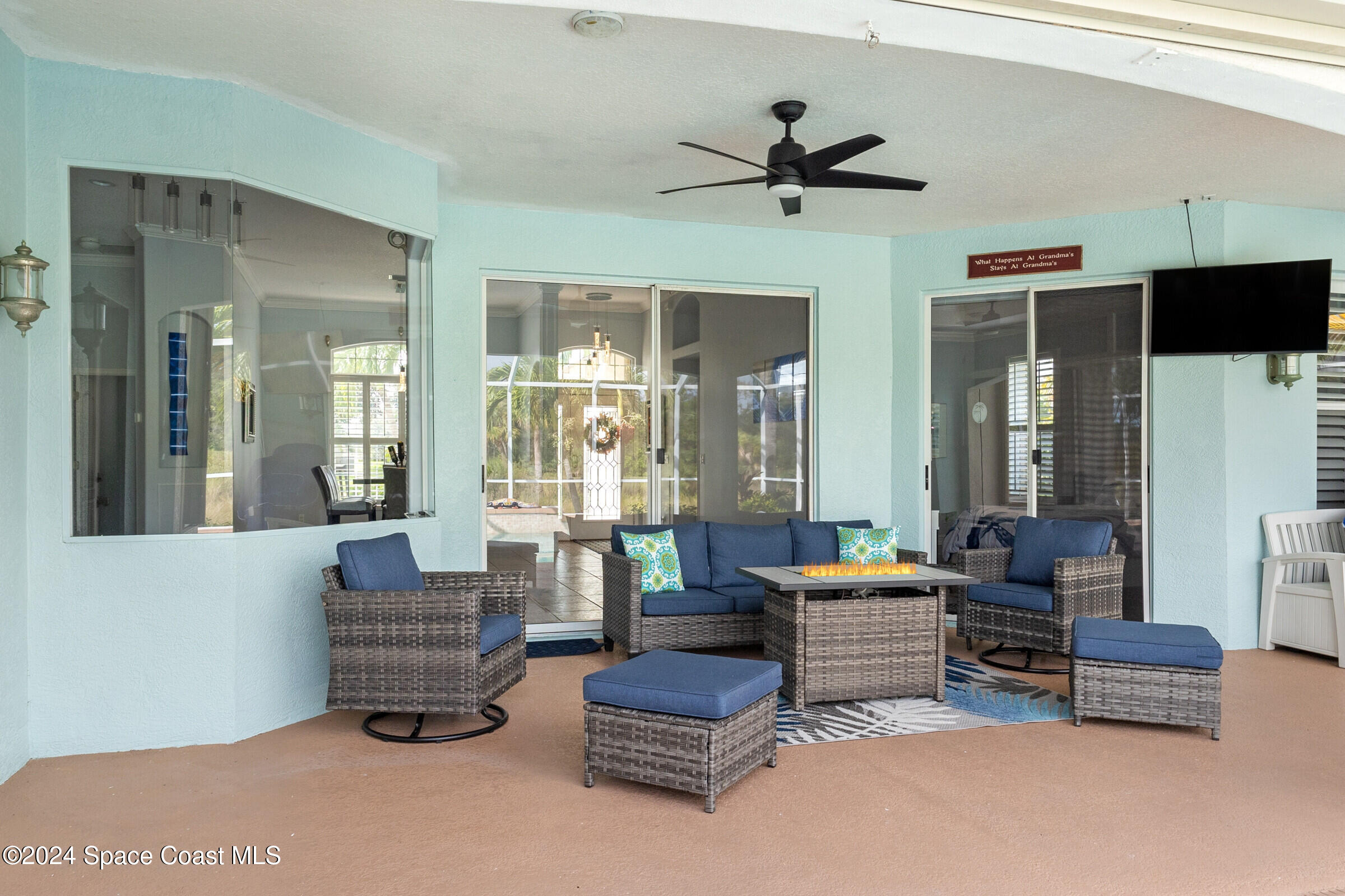 4481 Aberdeen Circle Rockledge, FL 32955 - Photo 29 of 50 a living room with furniture and a large window