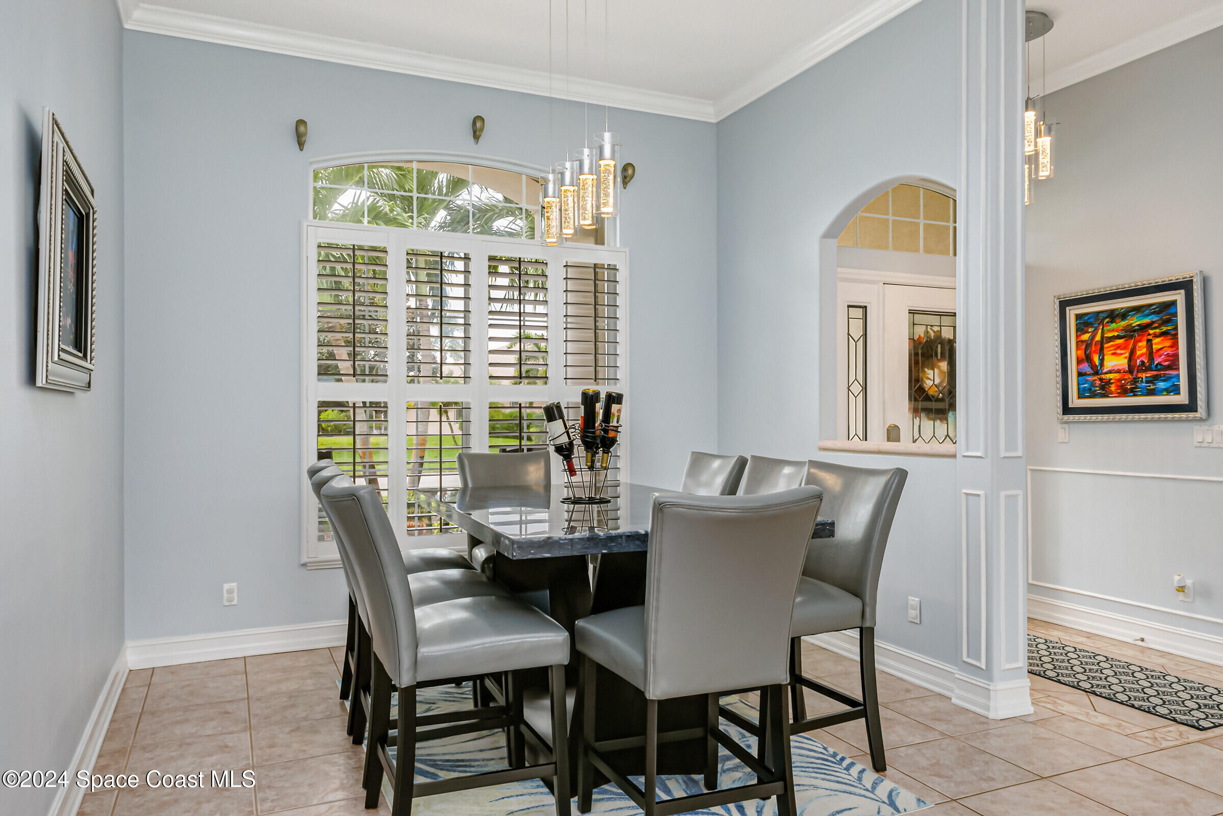 4481 Aberdeen Circle Rockledge, FL 32955 - Photo 3 of 50 a view of a dining room with furniture window and outside view