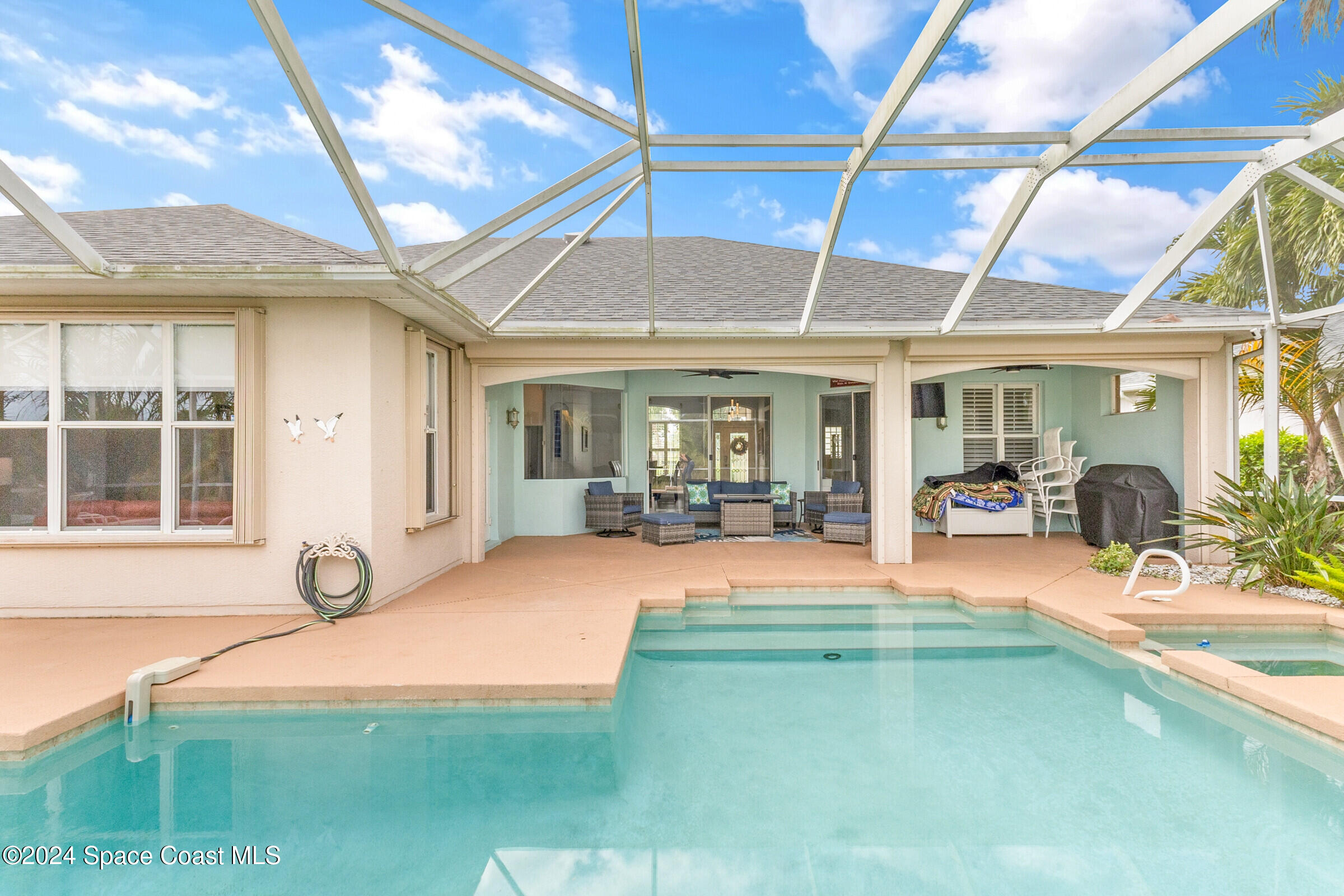 4481 Aberdeen Circle Rockledge, FL 32955 - Photo 32 of 50 a view of a house with backyard and porch
