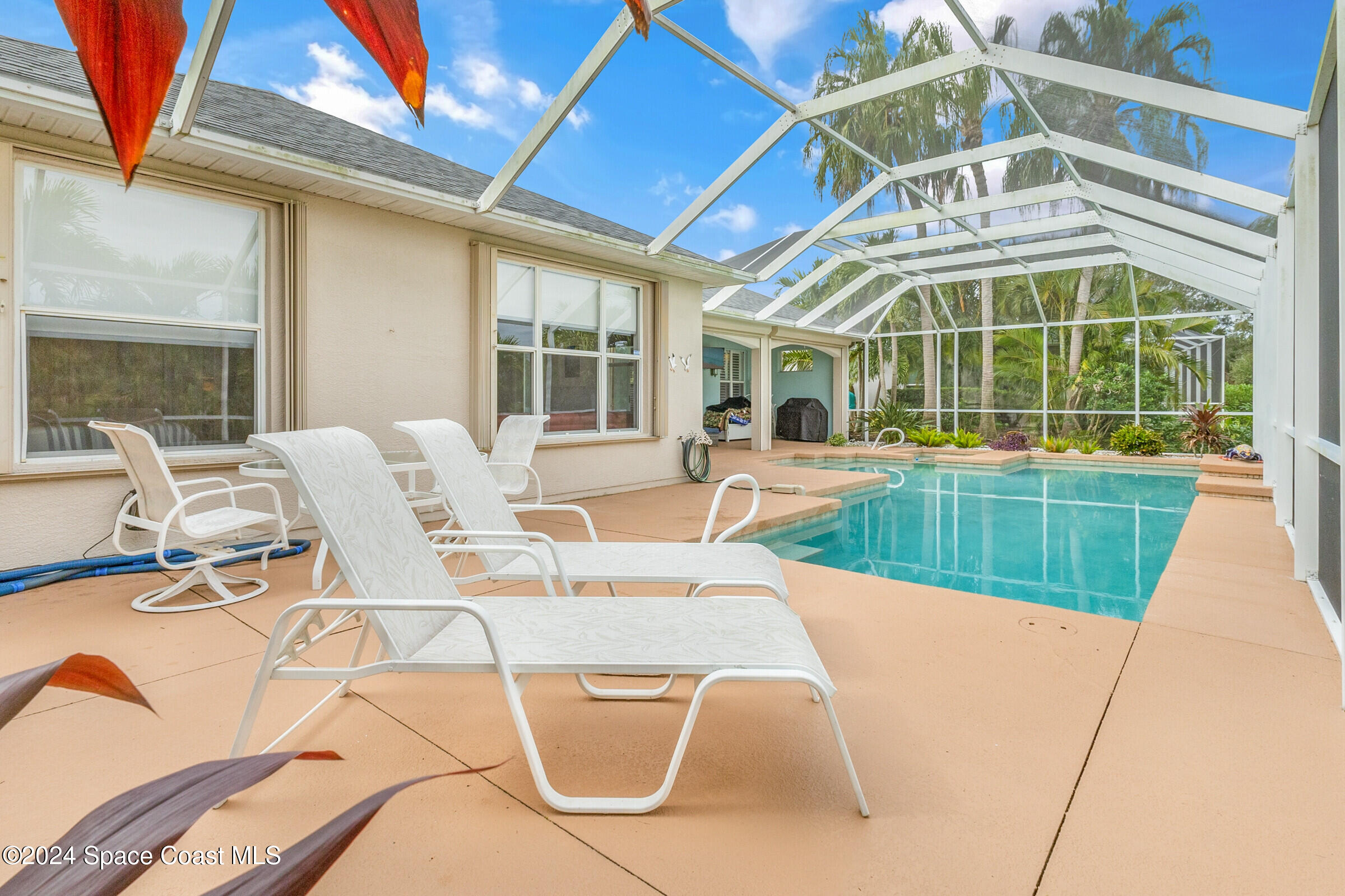 4481 Aberdeen Circle Rockledge, FL 32955 - Photo 35 of 50 a view of a house with swimming pool and porch