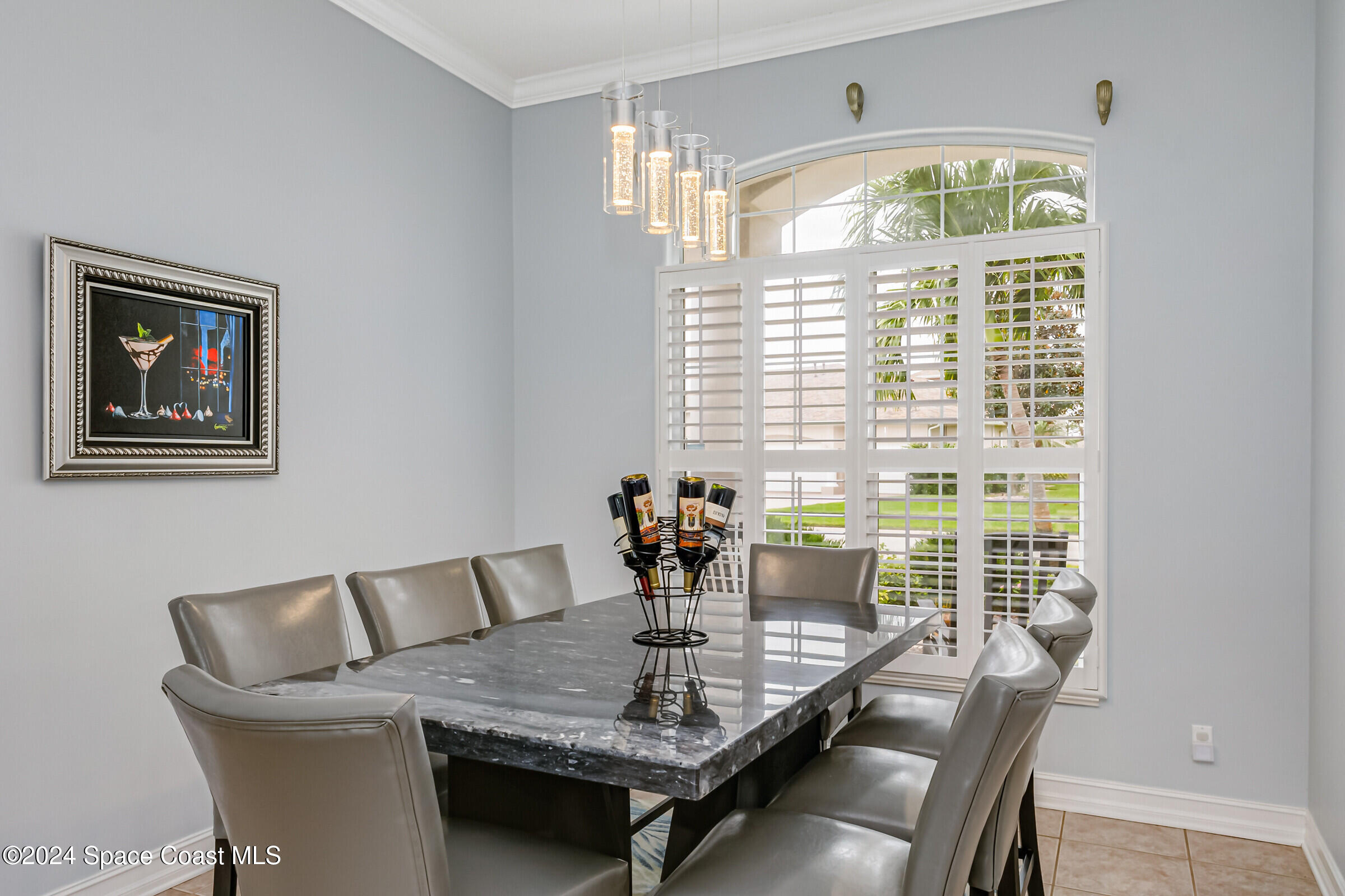 4481 Aberdeen Circle Rockledge, FL 32955 - Photo 4 of 50 a view of a dining room with furniture window and outside view