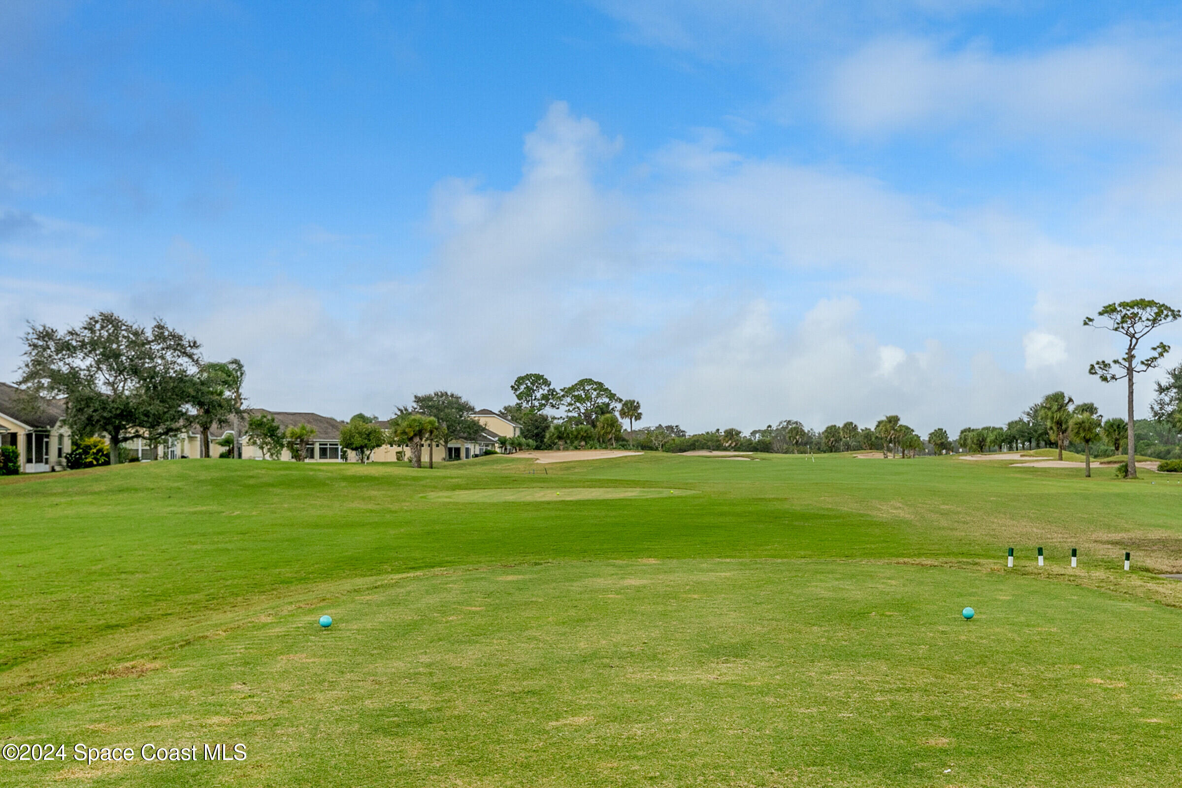 4481 Aberdeen Circle Rockledge, FL 32955 - Photo 46 of 50 a view of a golf course with a lake