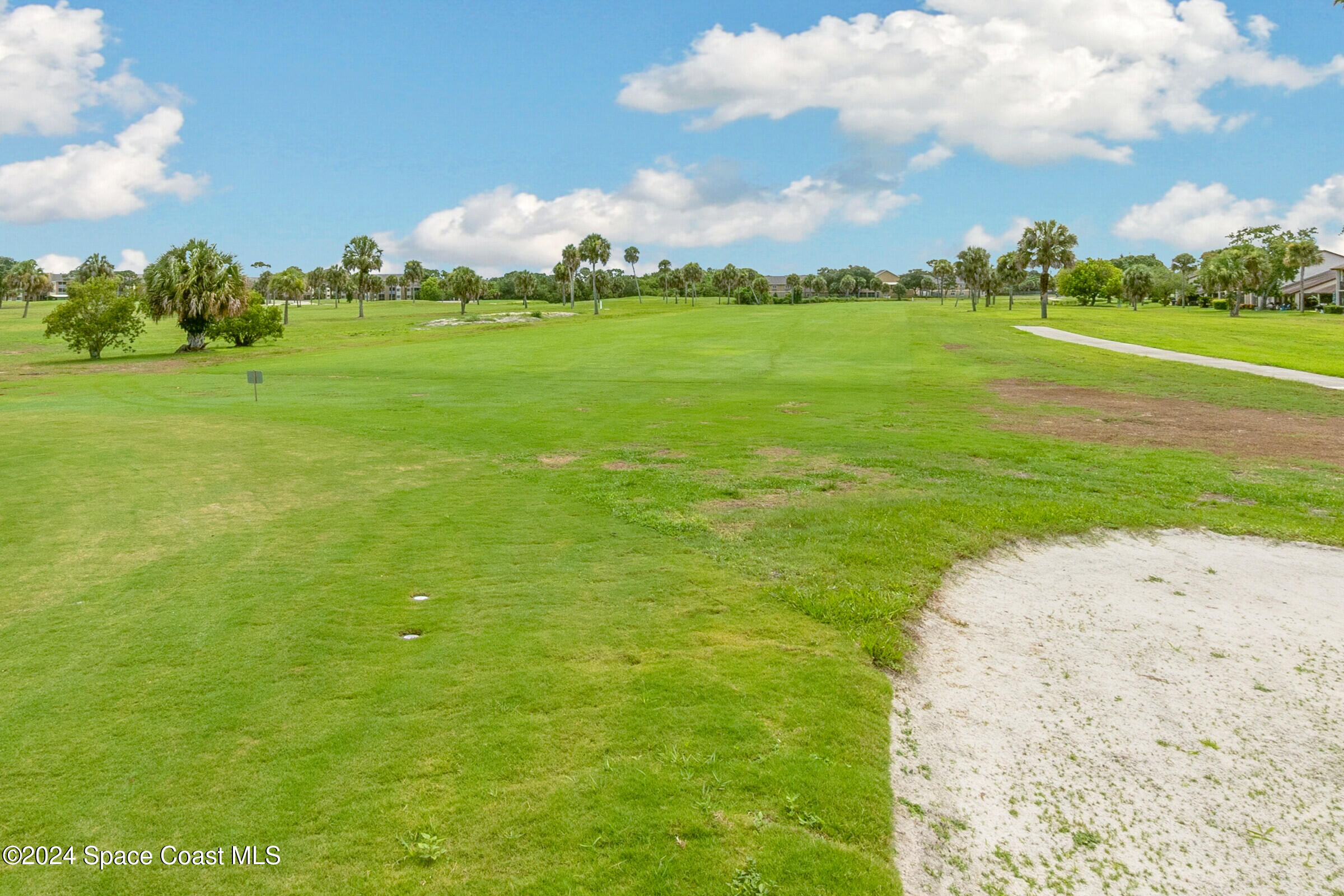 4481 Aberdeen Circle Rockledge, FL 32955 - Photo 49 of 50 a view of a big yard with lots of green space