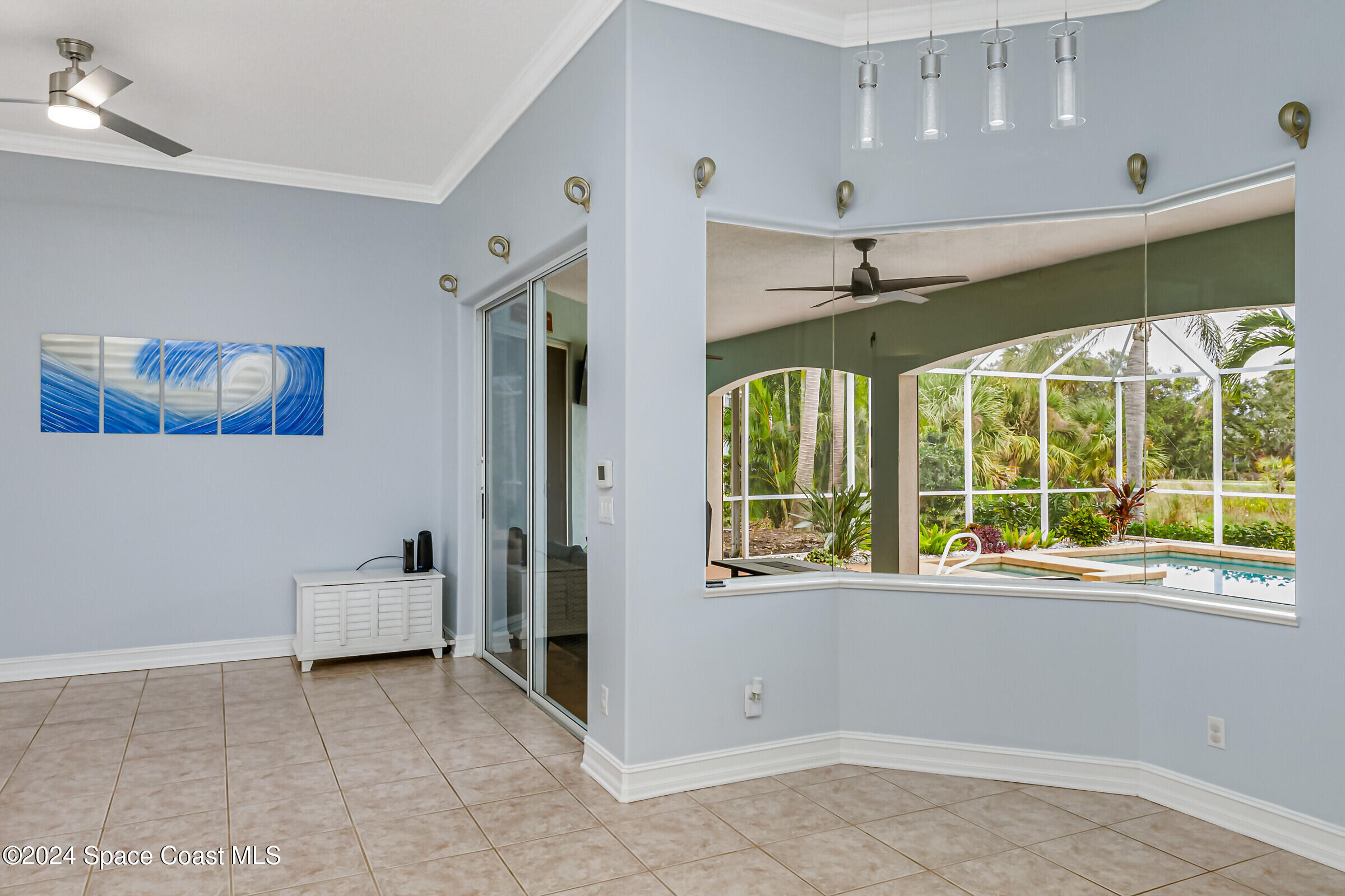 4481 Aberdeen Circle Rockledge, FL 32955 - Photo 8 of 50 a view of an empty room with a window