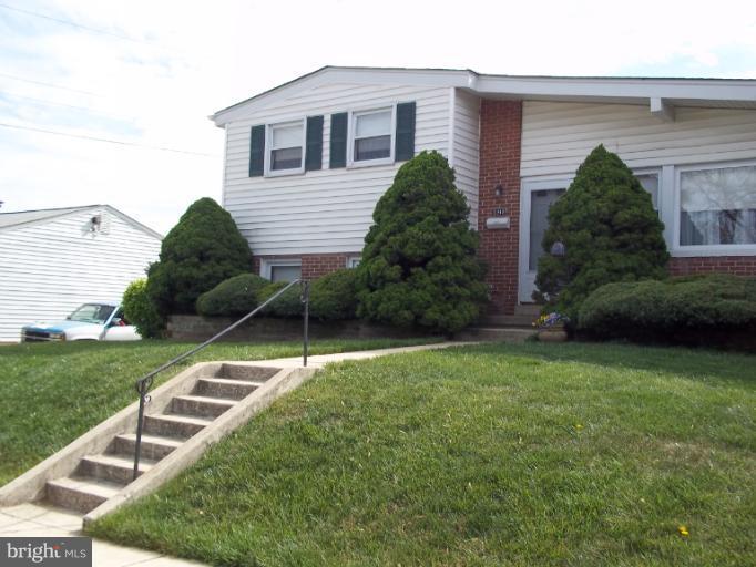 6919 Digby Road Gwynn Oak, MD 21207 - Photo 13 of 24 a house view with a garden space