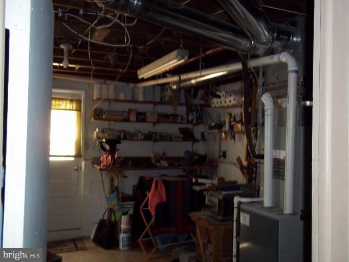 6919 Digby Road Gwynn Oak, MD 21207 - Photo 16 of 24 a view of storage and utility room