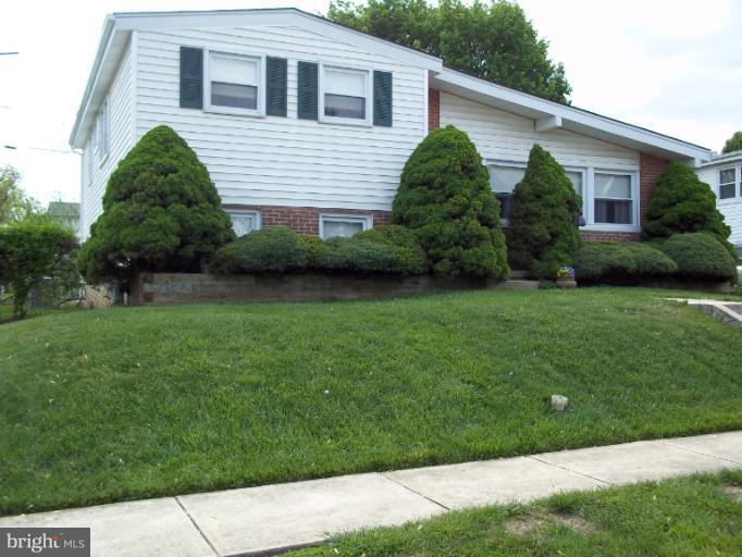 6919 Digby Road Gwynn Oak, MD 21207 - Photo 24 of 24 a house view with a garden space