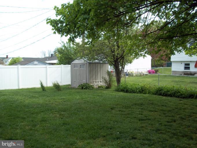 6919 Digby Road Gwynn Oak, MD 21207 - Photo 8 of 24 a view of a backyard with garden