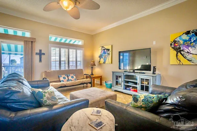 a bedroom with a large bed and flat tv