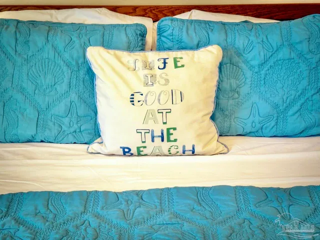 a view of kitchen island a stove and a window