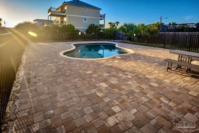 a view of balcony with wooden floor