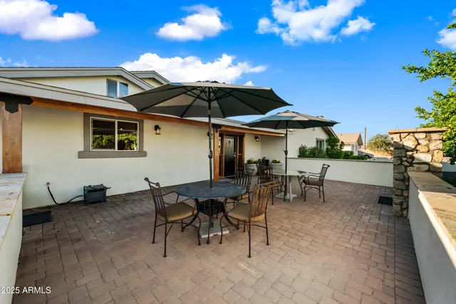 a outdoor space with lots of table and chairs