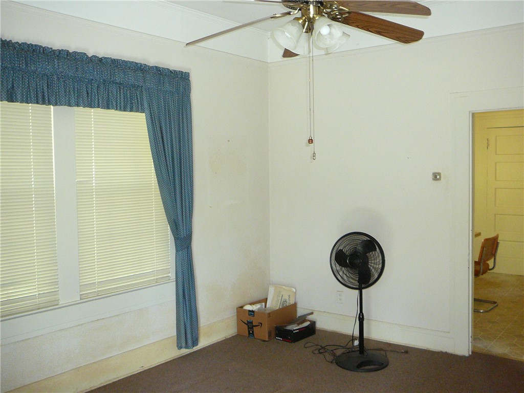 306 B Street Anderson, SC 29625 - Photo 4 of 8 This versatile room features a ceiling fan, ideal for comfort and air circulation.