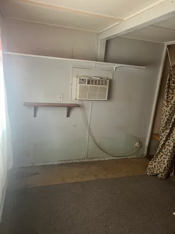 a view of storage and utility room with washer and dryer