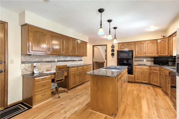 $875,000 | 1303 Hawk Creek Drive, Blue Springs, MO 64015
