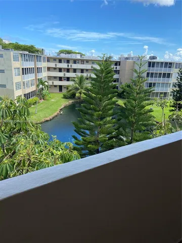 a view of a balcony with city view