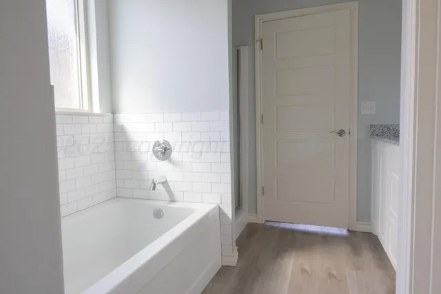 a bathroom with a bathtub