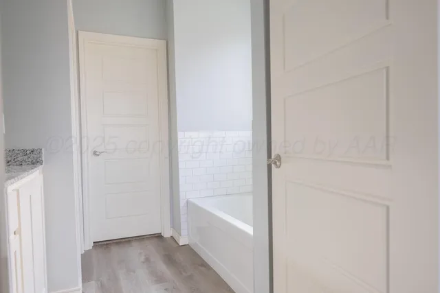 a bathroom with a bathtub