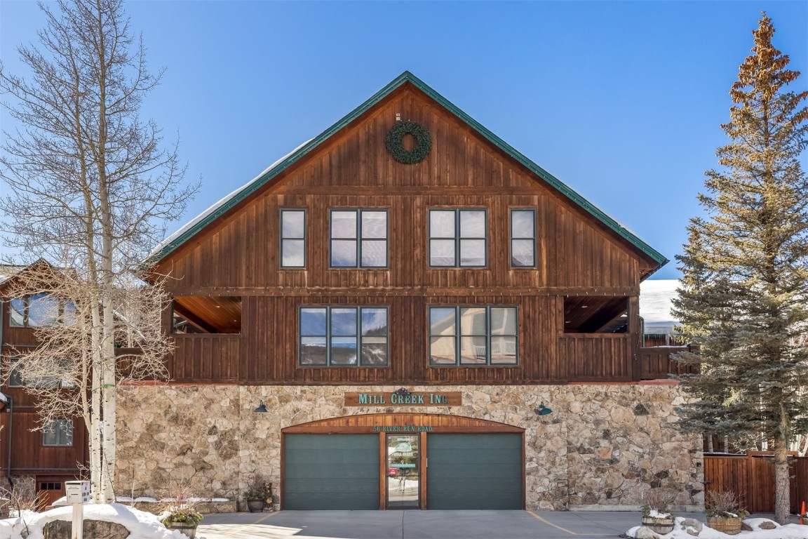 56 River Run Road, Unit 201 Keystone, CO 80435 - Photo 44 of 44 a front view of a house with a yard