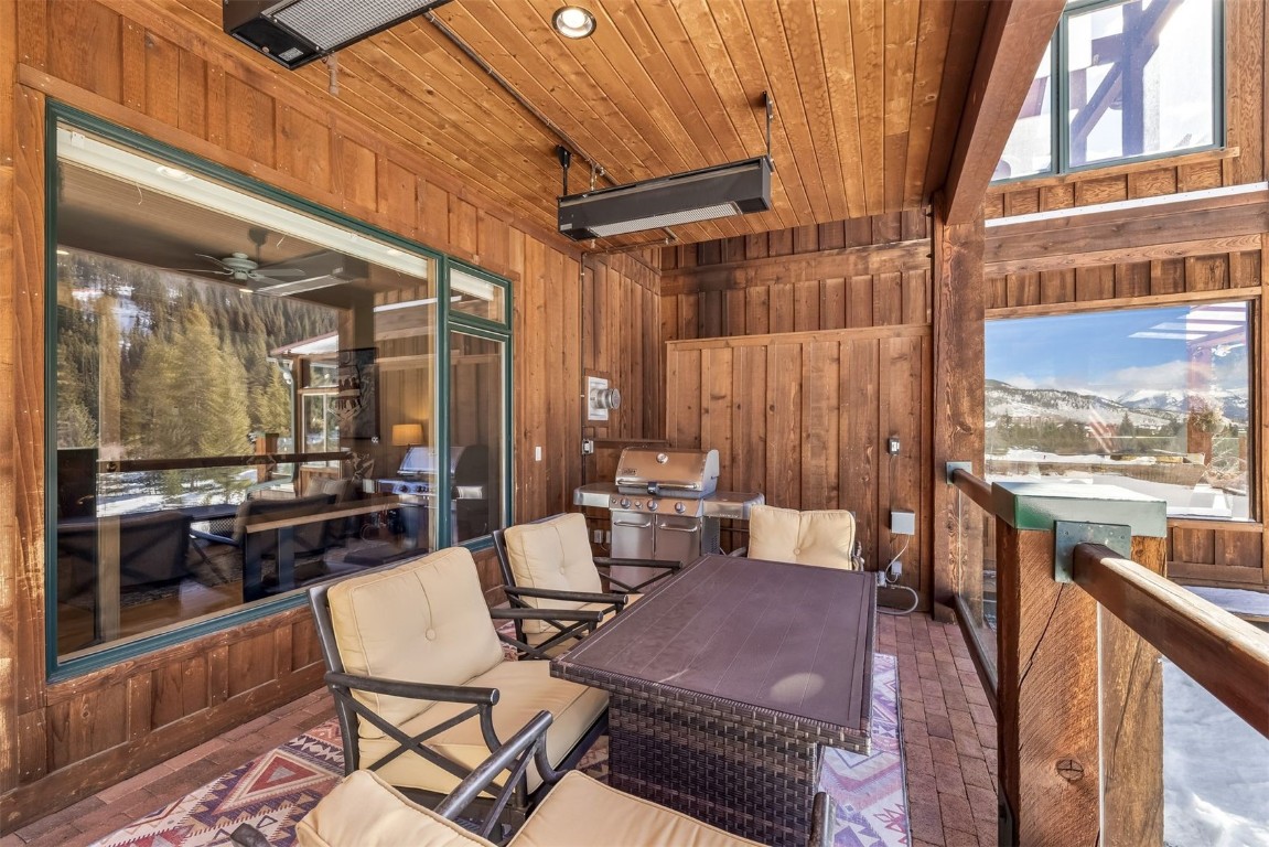 56 River Run Road, Unit 201 Keystone, CO 80435 - Photo 8 of 44 a balcony with chairs and outdoor view