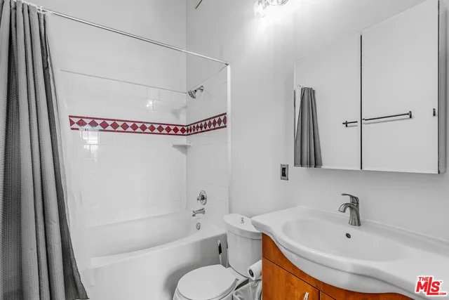 a bathroom with a sink and a bathtub