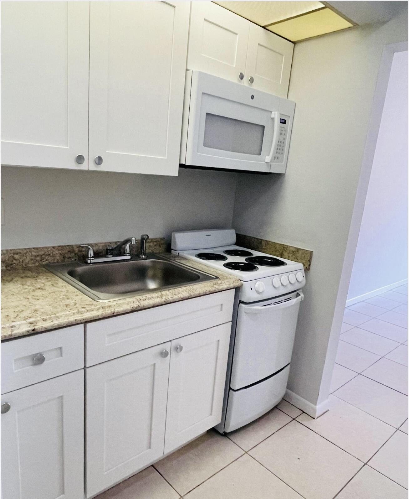628 Northwest 13th Street, Unit 120 Boca Raton, FL 33486 - Photo 1 of 7 IMG_6069
