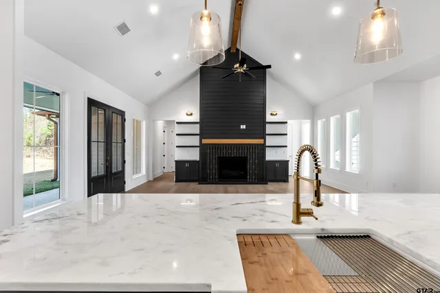 a view of a livingroom from a hallway