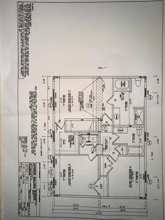 a view of a bathroom with shower