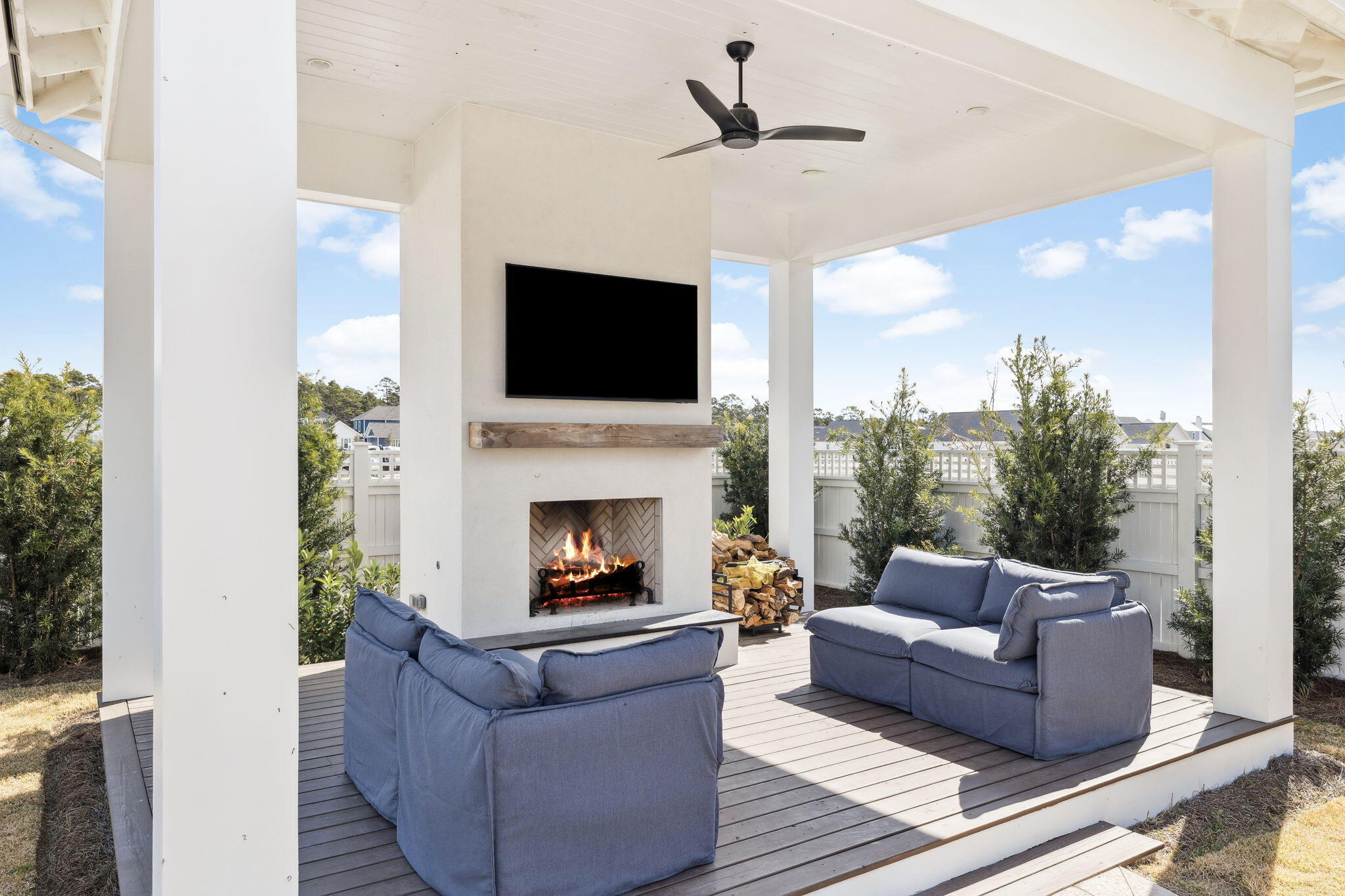 41 West Pollard Cove Inlet Beach Inlet Beach, FL 32461 - Photo 13 of 54 a living room with furniture a flat screen tv and a fireplace