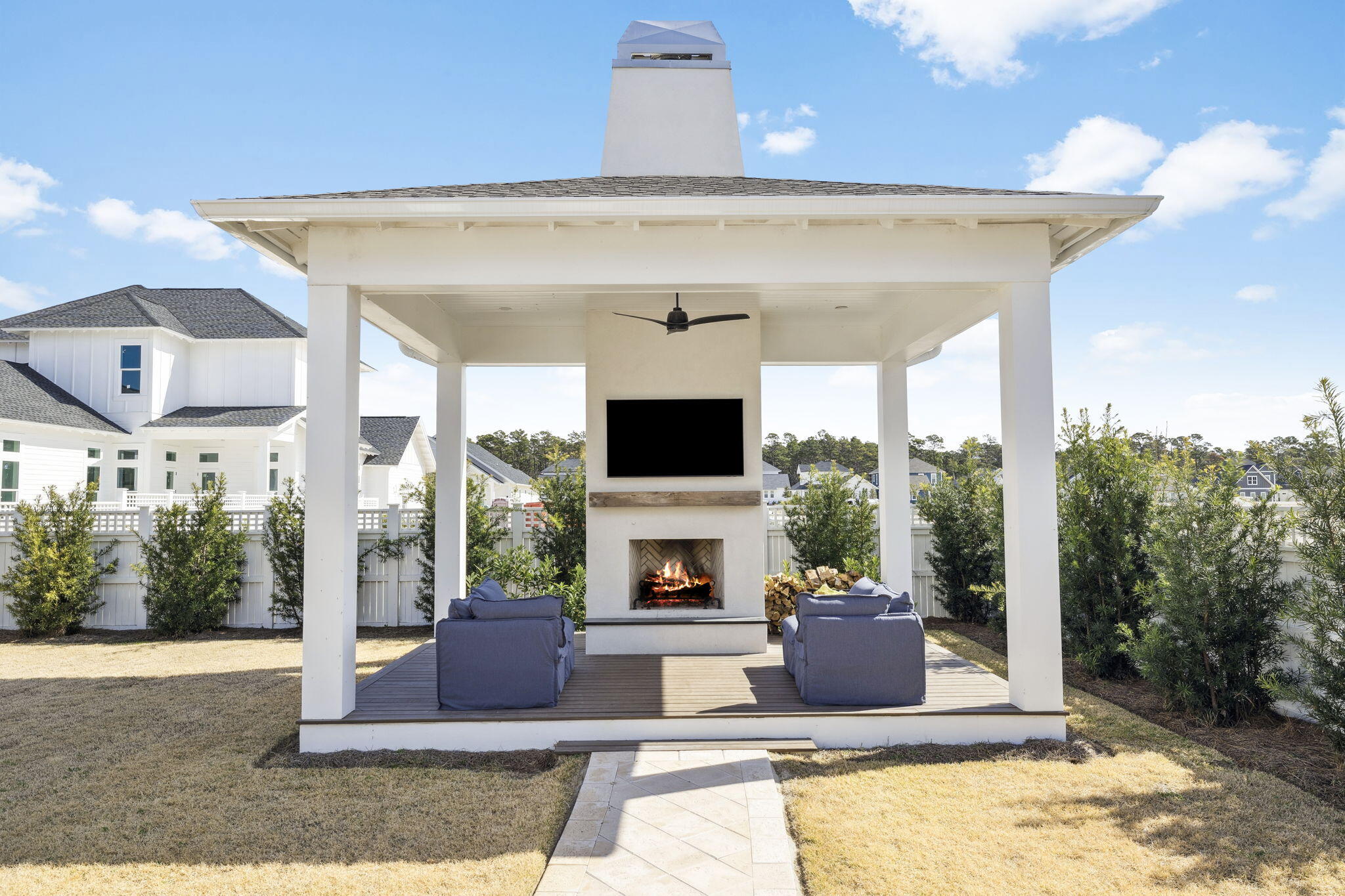 41 West Pollard Cove Inlet Beach Inlet Beach, FL 32461 - Photo 2 of 54 a view of a livingroom with furniture fire place and an outdoor space