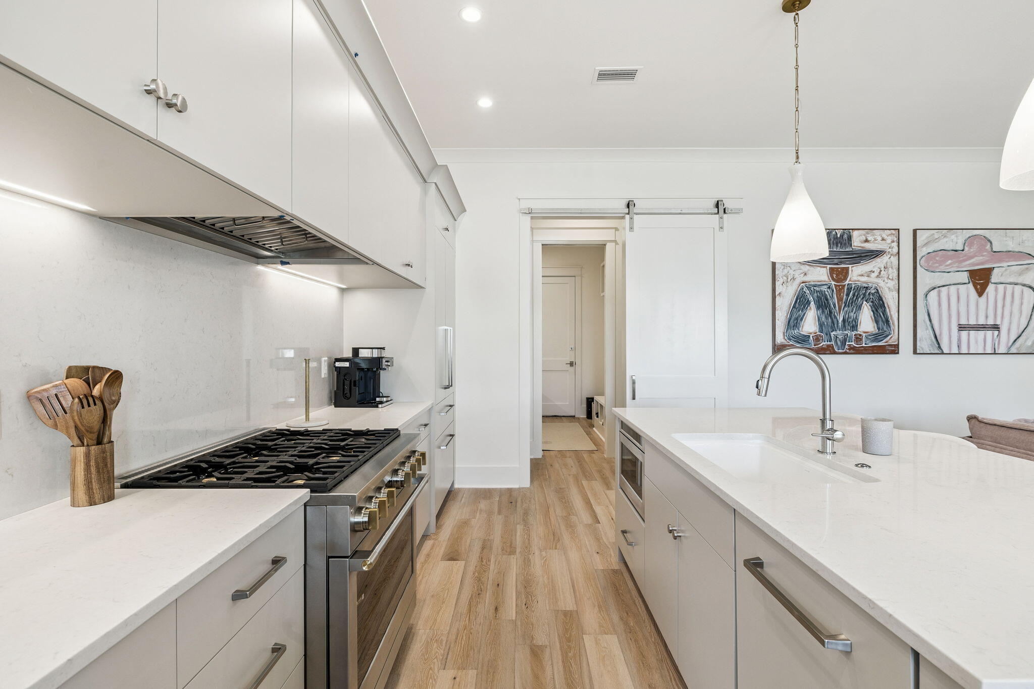 41 West Pollard Cove Inlet Beach Inlet Beach, FL 32461 - Photo 24 of 54 a kitchen with stainless steel appliances a sink stove and cabinets